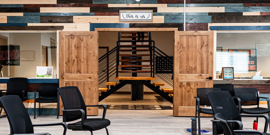 Entryway into community spaces and stairs to second level.